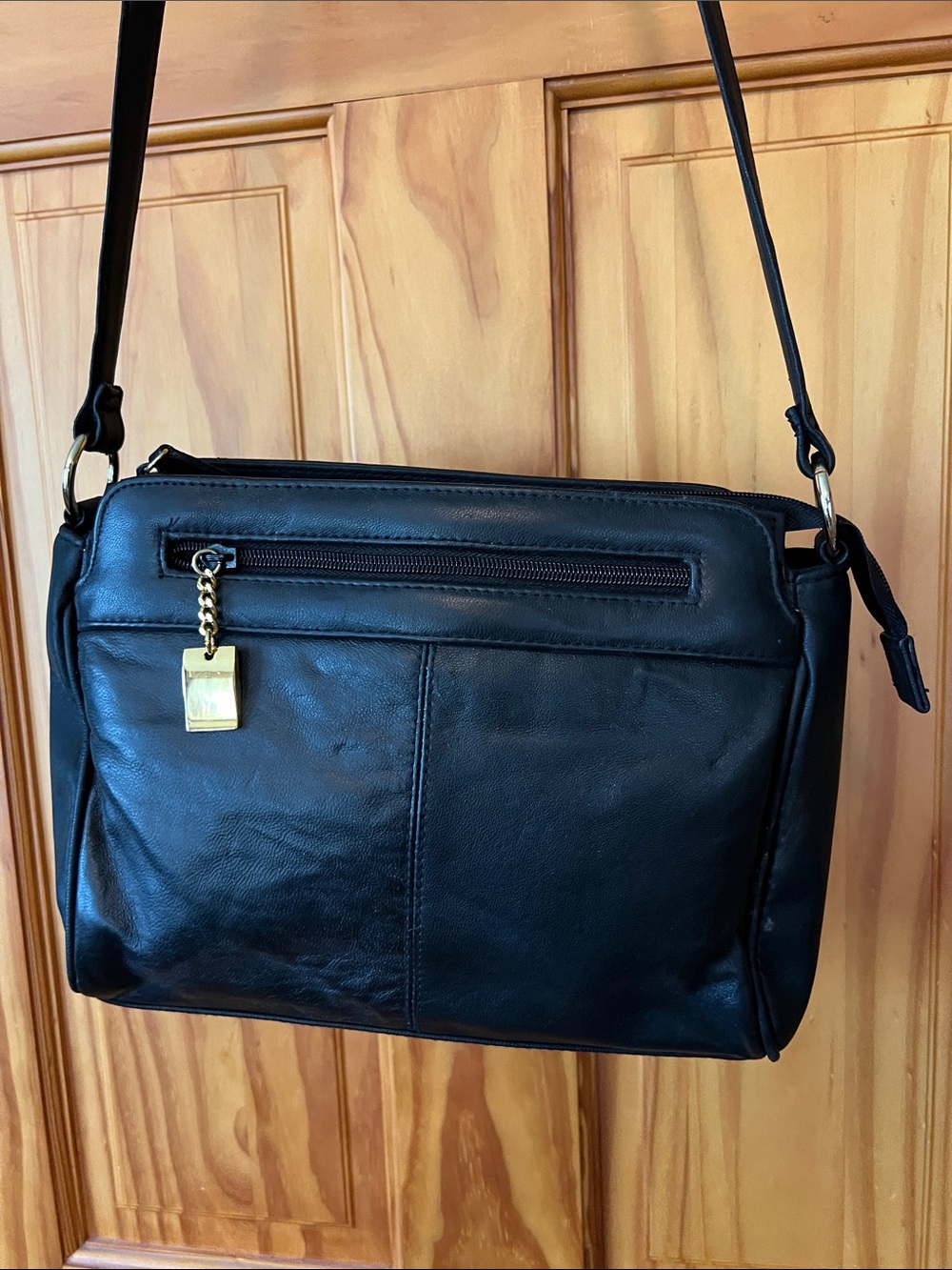 Elegant Black Leather Satchel with Gold Accent - Picture 2 of 16
